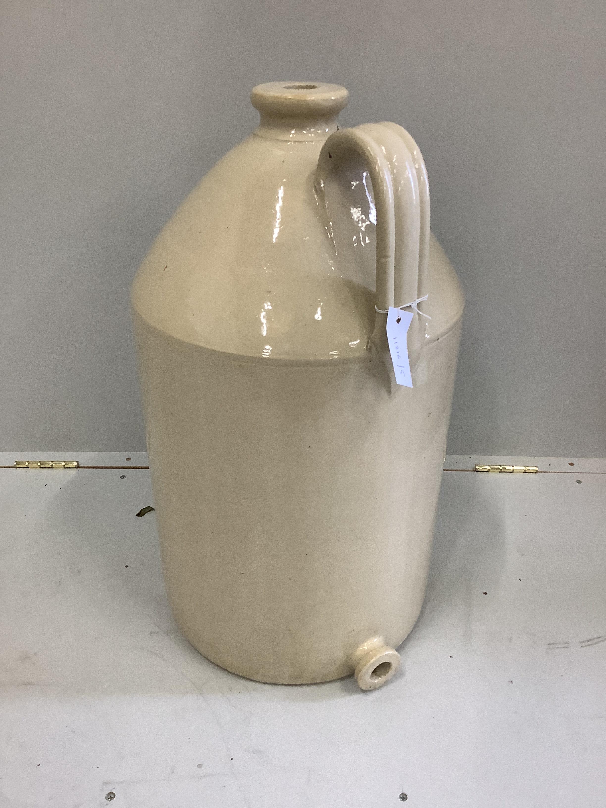 A large Doulton glazed earthenware flagon, height 64cm